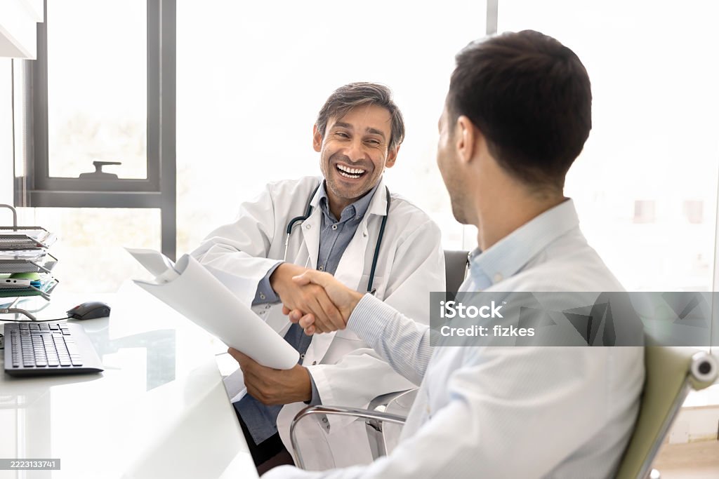 Sonographer preparing a patient for an ultrasound scan